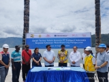 KABUPATEN SAMOSIR TERIMA TOTEM KAMORO DARI PT. FREEPORT UNTUK KAWASAN WATER FRONT CITY PANGURURAN 